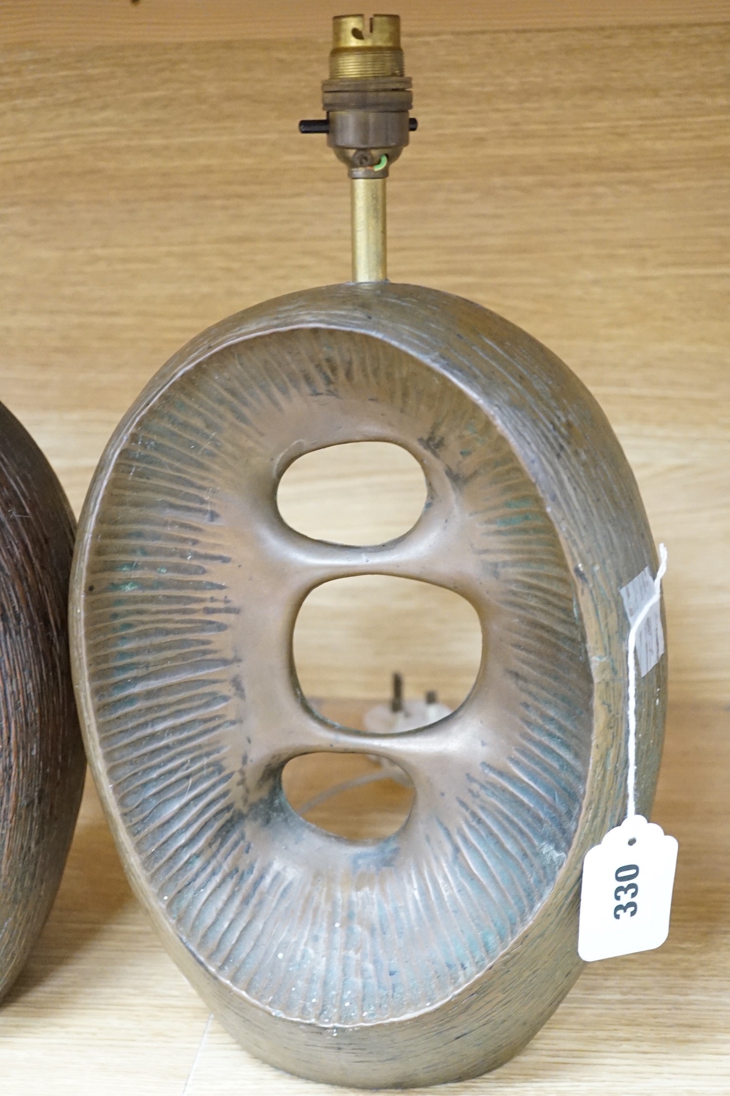 A pair of resin, bronzed finish sculptural table lamps, 40cm total height